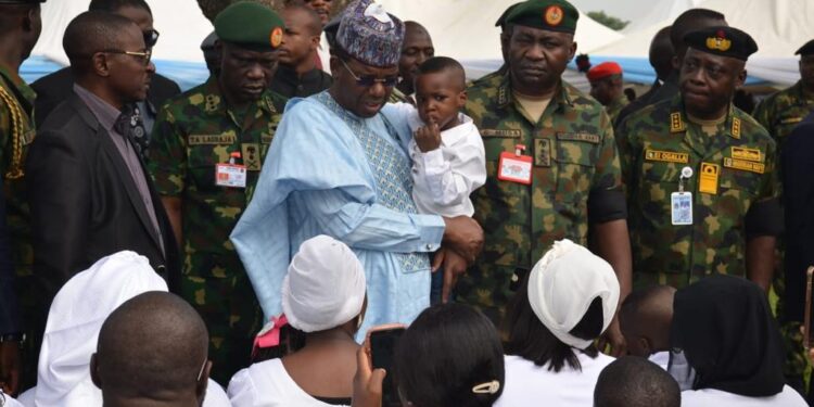 Minister, service chiefs in military cemetery for burial of officers killed