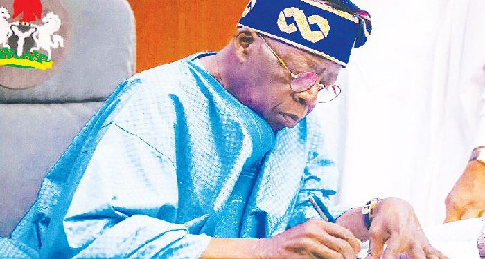 BREAKING: Tinubu signs student loan bill into law