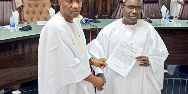 Amupitan warns against misconduct as INEC swears in new Oyo REC, Prof Tella