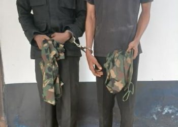 Suspected naval impersonators handed over to police by Nigerian Navy Ship Victory in Calabar