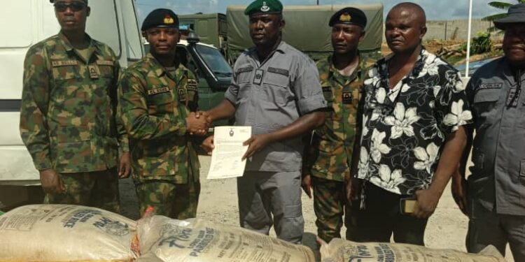 Nigerian Navy Intercepts Smuggled Rice, Transfers 125 Bags To Customs In Lagos