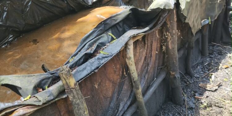 Navy Uncovers 12 Dugout Pits Containing Suspected Stolen Crude, Illegal AGO In Rivers